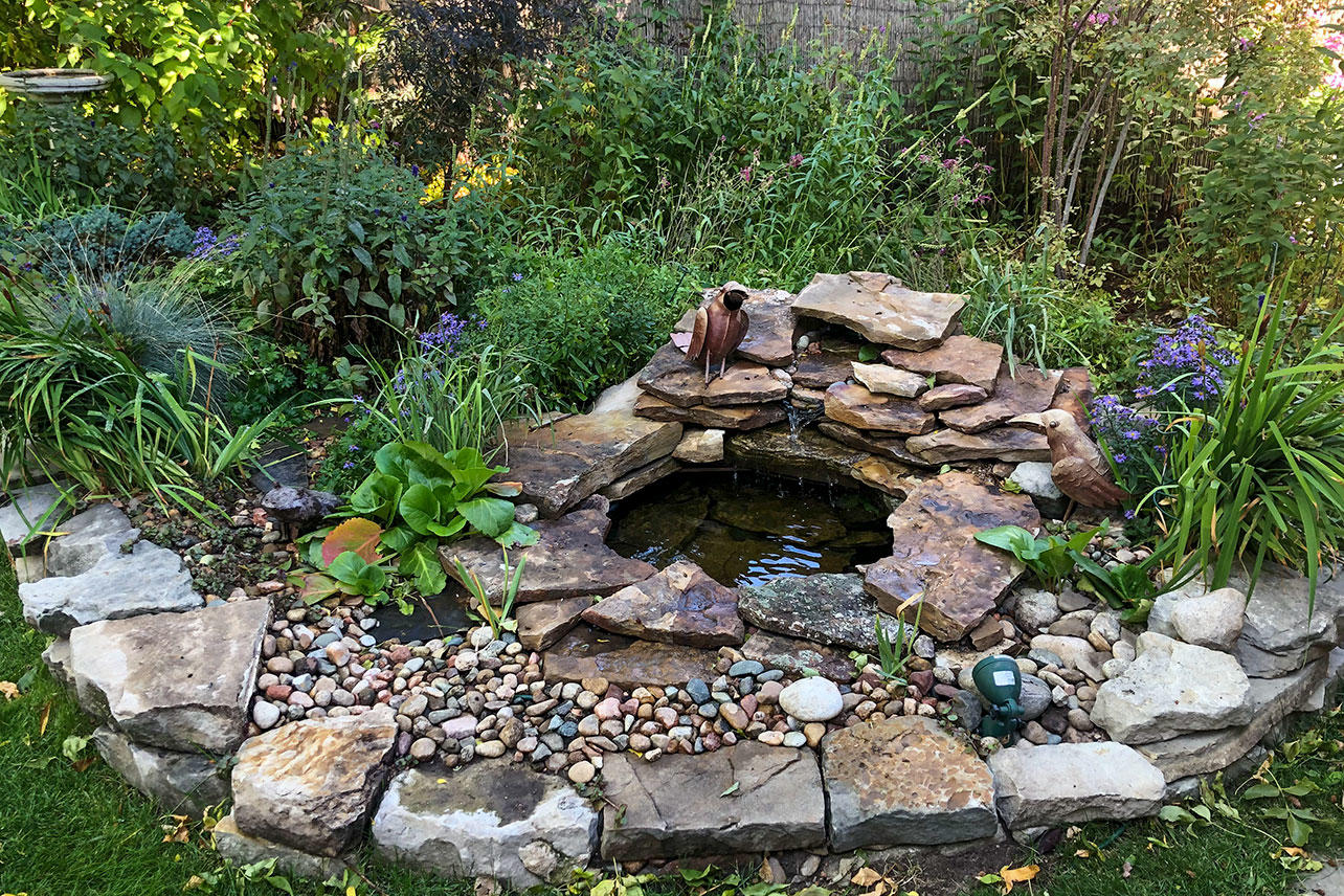 A water feature in the Palmas' garden.