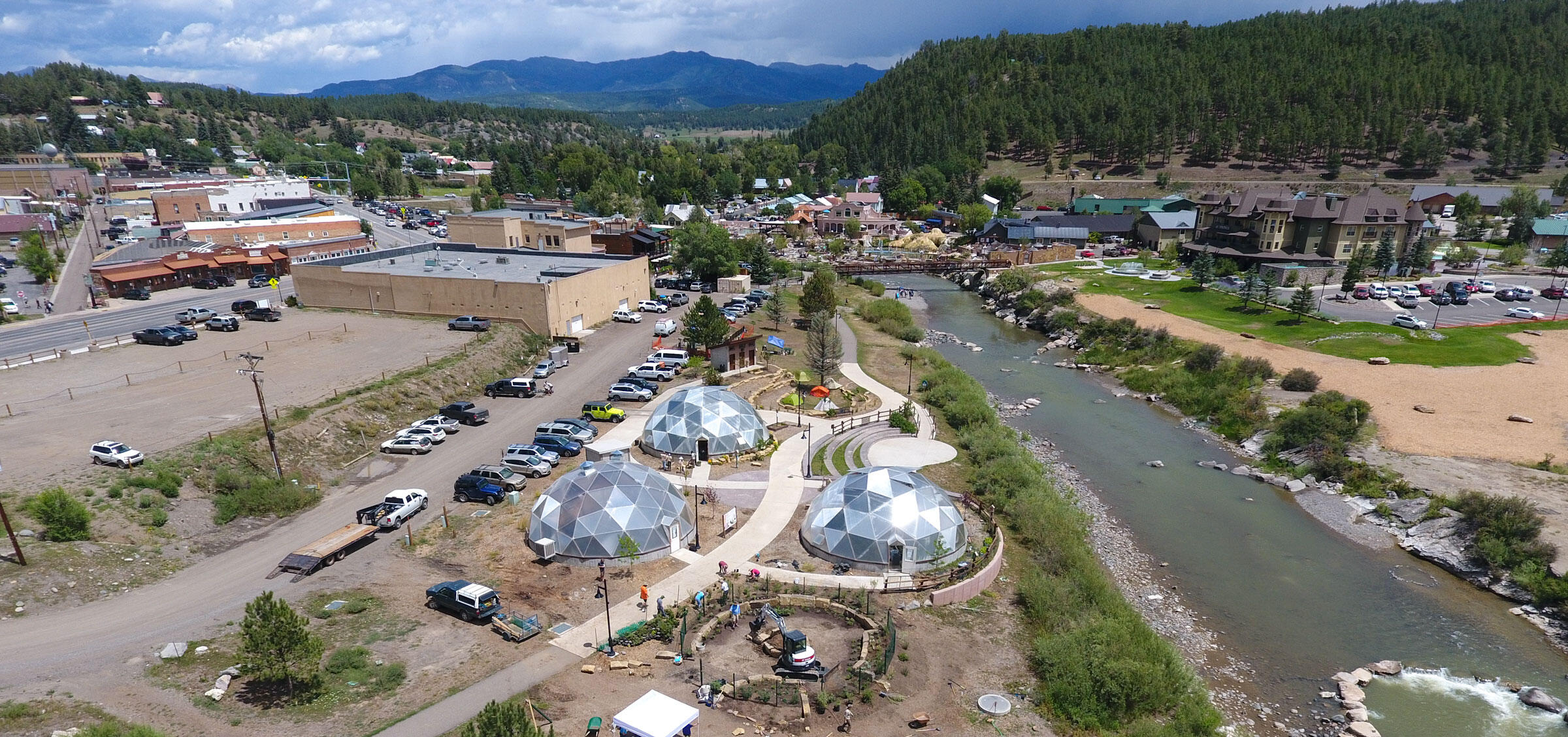A new garden sits in front of geothermal domes by the river in Pagosa Springs.