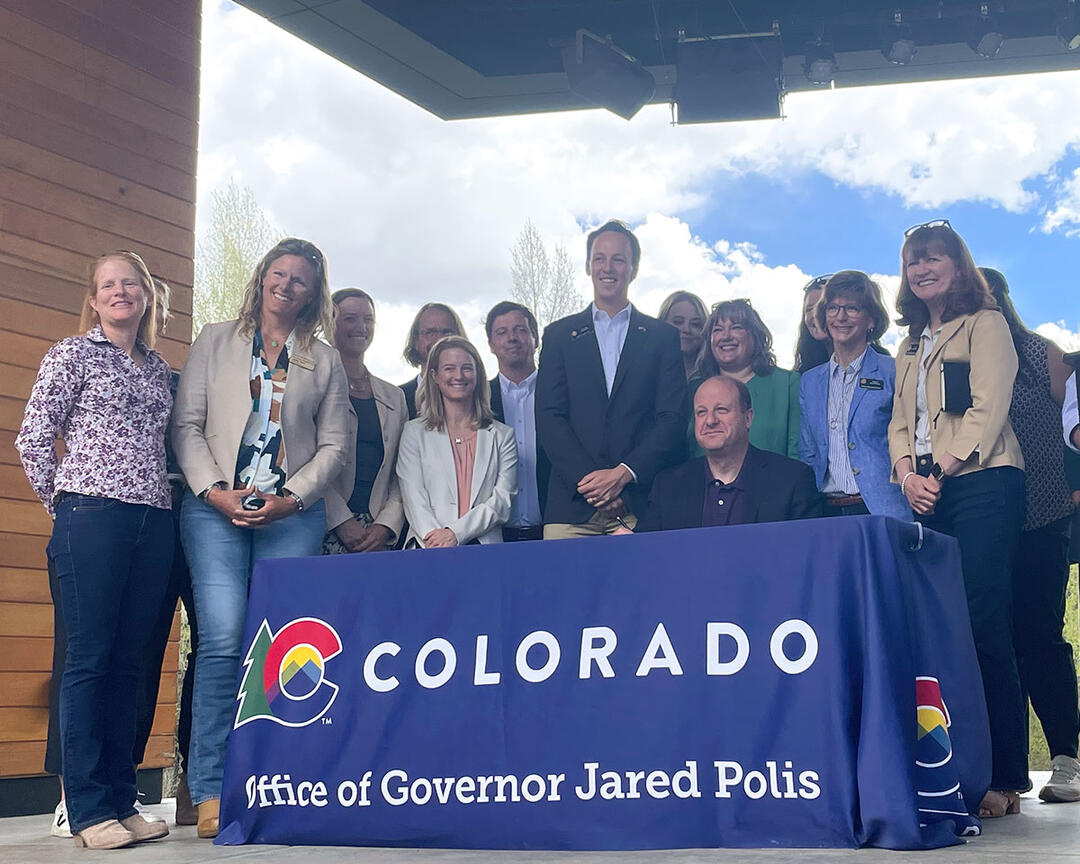 Colorado Governor Jared Polis at the HB24-1379 bill signing.